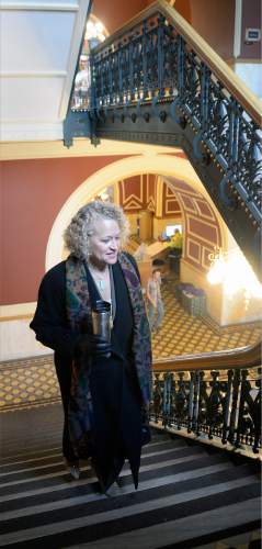 Al Hartmann  |  The Salt Lake Tribune
With coffee mug in hand, Mayor-elect Jackie Biskupski climbs stairs to her temporary fourth floor office in Salt Lake City Hall.