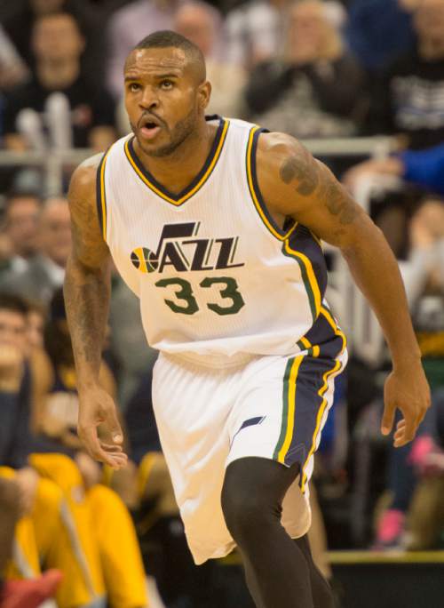 Rick Egan  |  The Salt Lake Tribune

Utah Jazz forward Trevor Booker (33) checks the clock as he shot brig the Jazz with in 3 points in the final minutes of the game, in NBA action, Utah vs Indiana, at EnergySolutions Arena, Monday, January 5, 2015