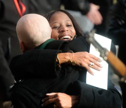 Steve Griffin  |  The Salt Lake Tribune

Rep. Mia Love hugs Salt Lake City Council member Derek Kitchen before the Oath of Office Ceremony for newly elected officials at the City & County Building in Salt Lake City, Monday, January 4, 2016.