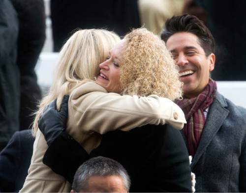 Steve Griffin  |  The Salt Lake Tribune

Salt Lake Mayor Jackie Biskupski hugs supporters and friends before Oath of Office Ceremony for her and council members Andrew Johnston, Derek Kitchen and Charlie Luke at the City & County Building in Salt Lake City, Monday, January 4, 2016.