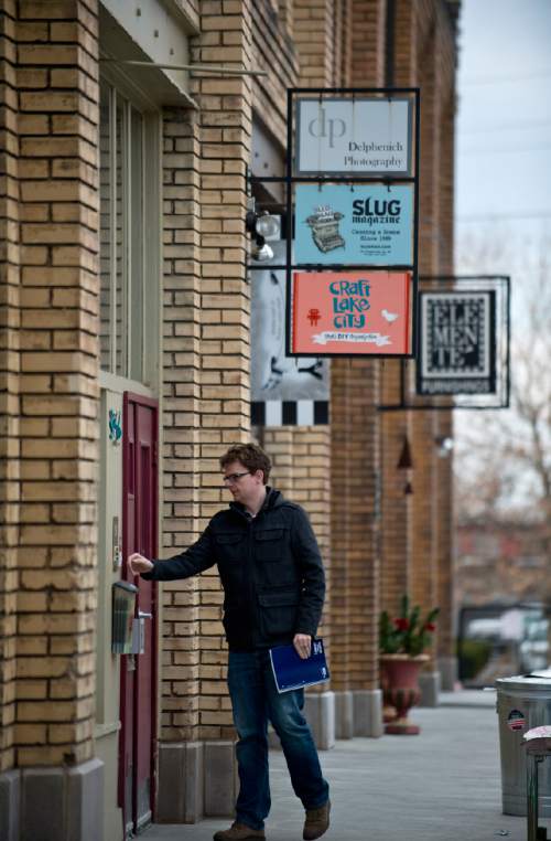 Lennie Mahler  |  The Salt Lake Tribune

A man rings the door to the SLUG Magazine space on Pierpont Avenue between 300 and 400 West in Salt Lake City, Friday, Feb. 27, 2015. The Eccles Browning Warehouse, a long-time home to small artisan businesses, was sold in January to an out-of-state residential developer.