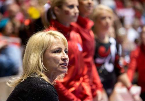 Lennie Mahler  |  The Salt Lake Tribune
Co-head coach Megan Marsden observes the Red Rocks as they warm up on the uneven bars in a meet against Oregon State, West Virginia, and SUU at the Huntsman Center, Saturday, Jan. 19, 2013. The Red Rocks edged the competition with a final score of 196.950, followed by Oregon State with a score of 195.950.