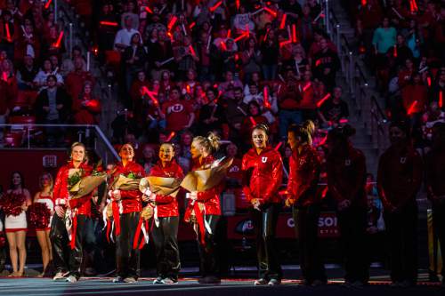 Chris Detrick  |  The Salt Lake Tribune
Members of the Utah gymnastics team (l-r) Tory Wilson, Becky Tutka, Corrie Lothrop, Georgia Dabritz, Kailah Delaney and Tiffani Lewis are introduced before the gymnastics meet against Michigan at the Jon M. Huntsman Center Friday March 6, 2015. Utah defeated Michigan 198.250 to 197.675.