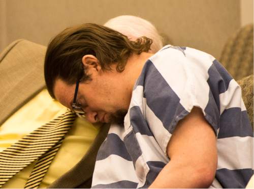 Rick Egan  |  The Salt Lake Tribune

Joshua Schoenenberger listens to defense attorney,Ed Brass during a preliminary hearing, Thursday, January 7, 2016. Schoenenberger is accused of fatally beating his girlfriend's 2-year-old son to death.