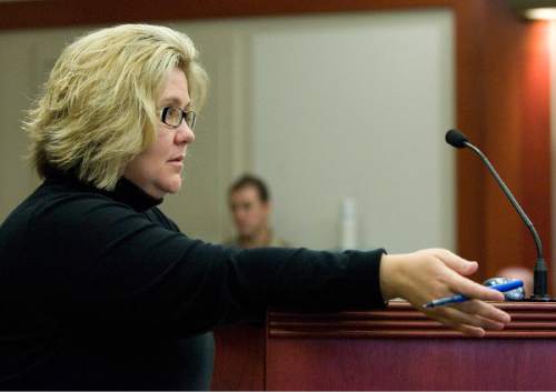 Paul Fraughton | Salt Lake Tribune

Defense attorney Denise Porter  questions Mar Mae Rar Phi at the preliminary hearing, on Friday, November 9, 2012, of Esar Met who is accused of  killing 7 year-old Hser Ner Moo.