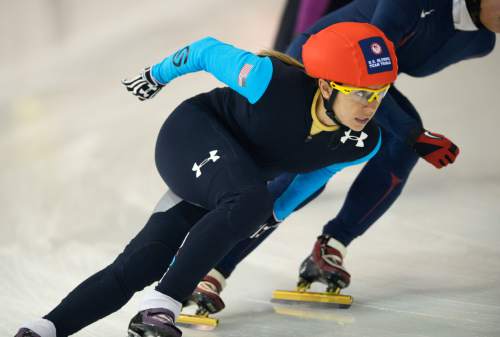 Steve Griffin  |  The Salt Lake Tribune


 Jessica Smith eyes the corner during the 1500-meter race in the 2014 U.S. Olympic Short Track Trials at the Utah Olympic Oval in Kearns, Friday, January 3, 2014.