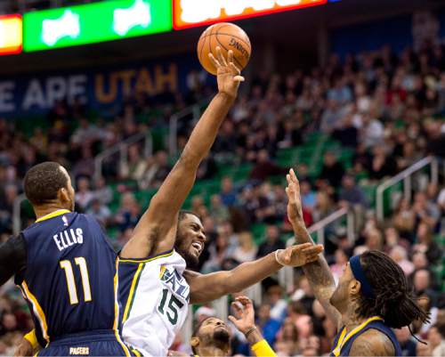 Lennie Mahler  |  The Salt Lake Tribune

Derrick Favors is blocked by Indiana Pacers guard Monta Ellis as Paul George and Jordan Hill defend in the first half of an NBA basketball game at Vivint Smart Home Arena on Saturday, Dec. 5, 2015.