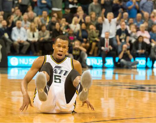 Rick Egan  |  The Salt Lake Tribune

Utah Jazz guard Rodney Hood (5) hits the floor, after being fouled while shooting a 3-point shot, in NBA action, The Utah Jazz vs. The Houston Rockets, in Salt Lake City, Monday, January 4, 2016.