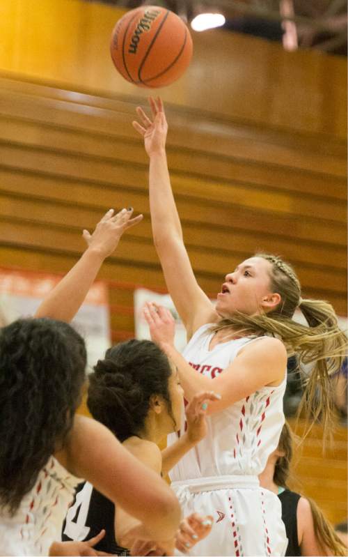 Rick Egan  |  The Salt Lake Tribune

Bountiful High's Mallory Evans (15) takes a shot for the Braves, in prep basketball action, Bountiful Braves vs. Highland High Rams, in Bountiful, Friday, January 8, 2016.
