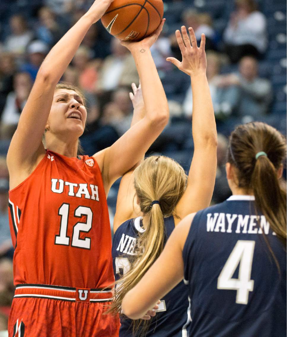 Rick Egan  |  The Salt Lake Tribune

Utah Utes forward Emily Potter (12) shoots over Brigham Young Cougars forward Amanda Wayment (4), in basketball action, BYU vs. Utah, in the Marriott Center, Saturday, December 12, 2015.