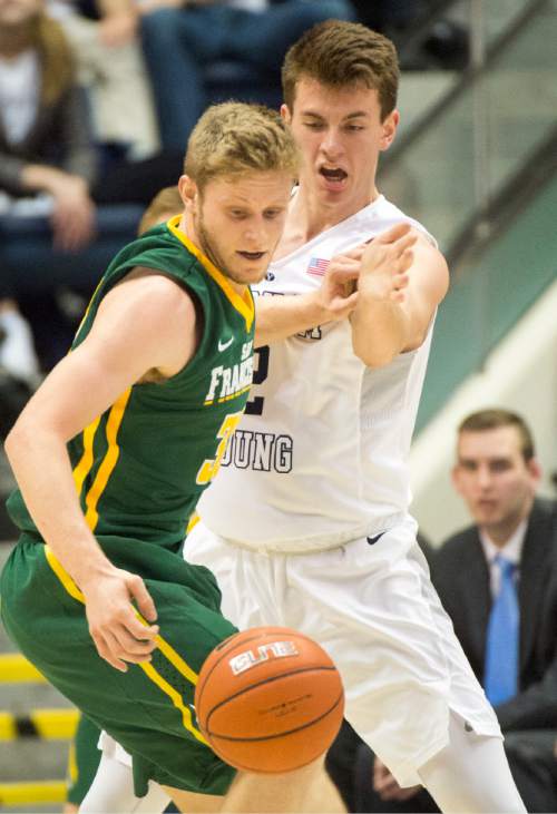 Rick Egan  |  The Salt Lake Tribune

Brigham Young Cougars guard Zac Seljaas (2) knocks the ball away from San Francisco Dons guard Tim Derksen (32), in basketball action BYU vs. San Francisco, at the Marriott Center, Saturday, January 9, 2015.