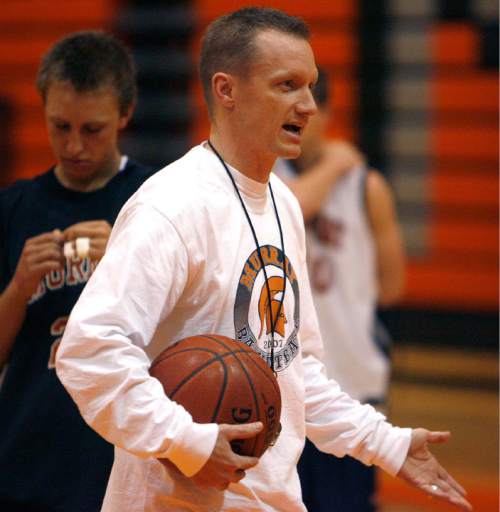 Paul Fraughton  |  The Salt Lake Tribune

Coach of the Murray High boy's basketball team, Jason Workman at a practice on Monday, January 14, 2008.