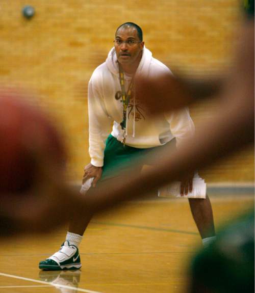 Steve Griffin  |  The Salt Lake Tribune
 
Kearns HIgh School boy's basketball coach Danny Cosby keeps a close eye on his team during practice at the high school in Kearns Monday, November 29, 2010.