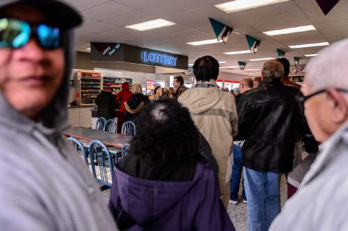 Trent Nelson  |  The Salt Lake Tribune
With the Powerball jackpot estimated at $1.4 billion for Wednesday's drawing, Utahns are flocking to the border for a slim chance at becoming an instant billionaire. The line for lottery tickets wrapped around the Malad, Idaho Top Stop gas station, Tuesday January 12, 2016.