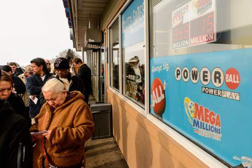 Trent Nelson  |  The Salt Lake Tribune
With the Powerball jackpot estimated at $1.4 billion for Wednesday's drawing, Utahns are flocking to the border for a slim chance at becoming an instant billionaire. The line for lottery tickets wrapped around the Malad, Idaho Top Stop gas station, Tuesday January 12, 2016.