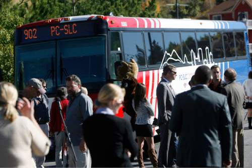 Francisco Kjolseth  |  The Salt Lake Tribune
People gather around one of the buses that will soon connect Park City with Salt Lake City as the Utah Transit Authority, Park City and Summit County held an event to celebrate the start of the new bus service as they gather at the Old Town Transit Center in Park City on Thursday, September 29, 2011. The service begins next Monday and will initially have three morning and three afternoon times in both directions.