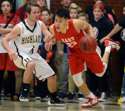 Steve Griffin  |  The Salt Lake Tribune


East's Dacian Spotted Elk tries to get past Highland's Will Trivce during Region 5 rival game at Highland High School in Salt Lake City, Tuesday, January 12, 2016. Highland defeated East in double overtime.