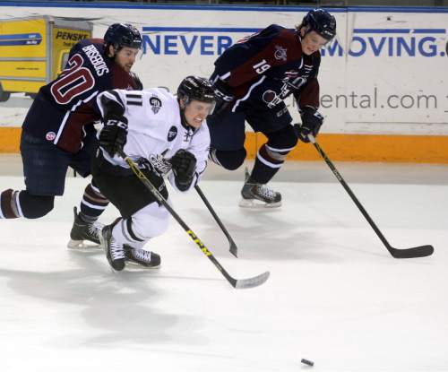 Steve Griffin  |  The Salt Lake Tribune


Grizzlies forward Josh Macdonald, center, charges up the ice during game against Tulsa at the Maverik Center in West Valley City, Wednesday, January 13, 2016.