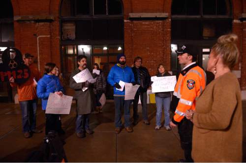 Leah Hogsten  |  The Salt Lake Tribune
Clean air activist Matt Pacenza, Executive Director of HEAL Utah is told by a Trolley Square security and a Falls Event Center employee to take their peaceful rally to the sidewalks away from the Utah Home Builders' Association annual gala – "Denim & Diamonds Awards Gala," Friday, January 15, 2016. The rally was to urge one of state's most powerful sectors to embrace commonsense public policies to clean up the Wasatch Front's dirty air.