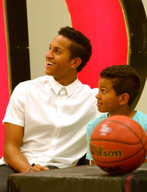 Leah Hogsten  |  The Salt Lake Tribune
l-r Frank Jackson and his younger brother Alvin during his unveiling ceremony. Lone Peak High School basketball guard Frank Jackson, one of the top basketball recruits in the country, announced his decision to play for Duke University, his choice over Stanford, Utah and BYU, Tuesday, September 1, 2015.