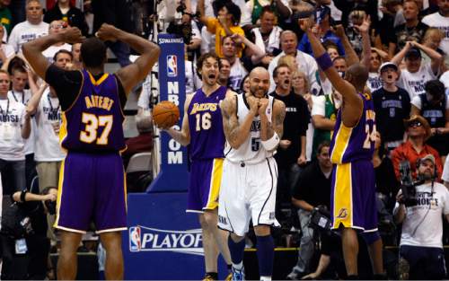 Chris Detrick | The Salt Lake Tribune

Utah Jazz's Carlos Boozer (5) reacts as Los Angeles Lakers' Ron Artest (37), Pau Gasol (16) and Kobe Bryant (24) celebrate their win at the buzzer as the Jazz face the Lakers in the game three of the second round of the playoffs at EnergySolutions Arena Saturday, May 8, 2010.