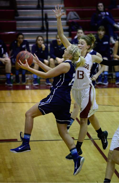 Scott Sommerdorf   |  The Salt Lake Tribune
Viewmont's Tori Pager tries to block this shot by Layton's Clara Wood during second half play. Layton rallied to beat Viewmont 47-39 in a Region 2 girls basketball game, Friday, January 15, 2016.