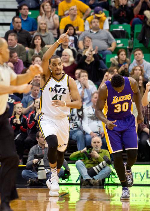Lennie Mahler  |  The Salt Lake Tribune

Trey Lyles celebrates a three-point basket in a game between the Utah Jazz and the Los Angeles Lakers at Vivint Smart Home Arena in Salt Lake City, Saturday, Jan. 16, 2016.