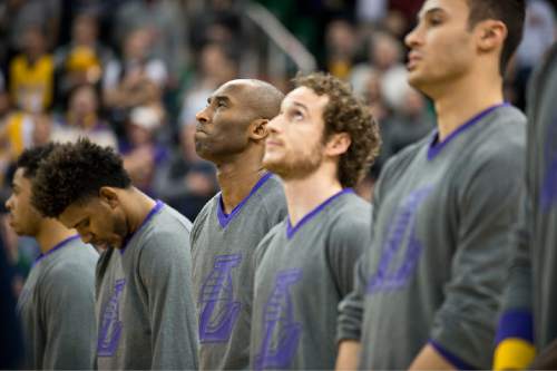 Lennie Mahler  |  The Salt Lake Tribune

Kobe Bryant listens as The Star-Spangled Banner is performed before a game between the Utah Jazz and the Los Angeles Lakers at Vivint Smart Home Arena in Salt Lake City, Saturday, Jan. 16, 2016.