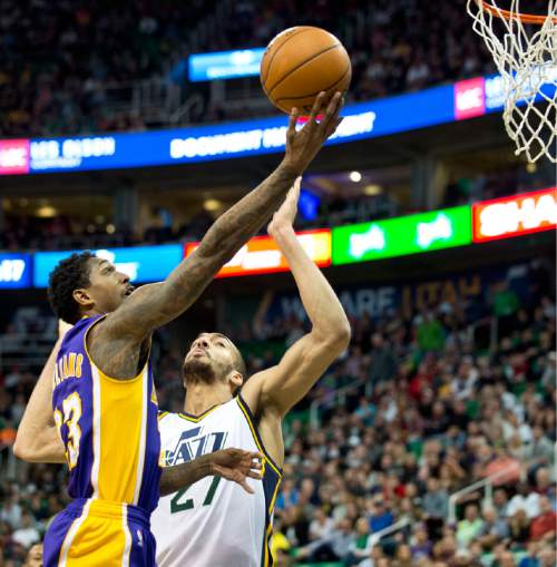 Lennie Mahler  |  The Salt Lake Tribune

Lou Williams puts up a shot over Rudy Gobert in a game between the Utah Jazz and the Los Angeles Lakers at Vivint Smart Home Arena in Salt Lake City, Saturday, Jan. 16, 2016.