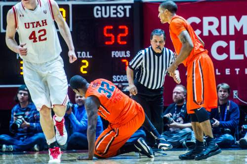 Chris Detrick  |  The Salt Lake Tribune
Oregon State Beavers forward Jarmal Reid (32) trips official Tommy Nunez during the game at the Huntsman Center Sunday January 17, 2016. Reid was called with a technical foul and ejected from the game. Utah Utes won the game against Oregon State Beavers 59-53.