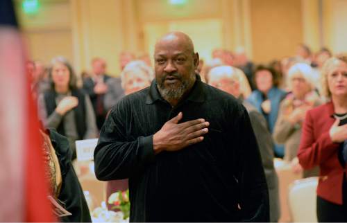 Al Hartmann  |  The Salt Lake Tribune
People stand for the Pledge of Allegiance at the 32nd Annual Dr. Martin Luther King Jr., Memorial Luncheon, hosted by NAACP at Little America in Salt Lake City Monday Jan 18.