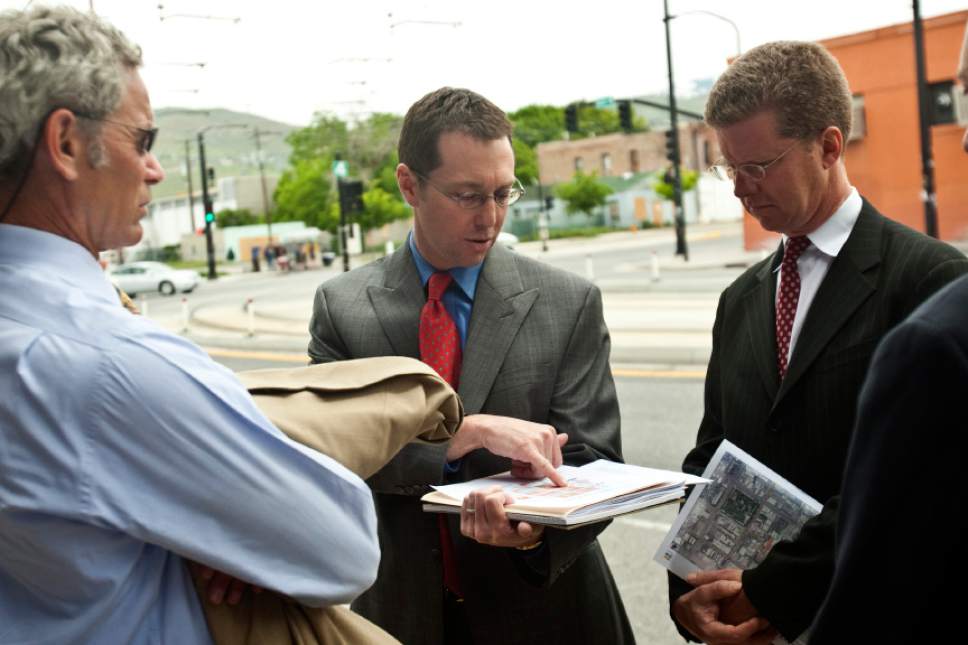 Photo by Chris Detrick | The Salt Lake Tribune 
Salt Lake City Mayor Ralph Becker, D.J. Baxter, executive director of the Redevelopment Agency of Salt Lake City, talk with U.S. Secretary of Housing and Urban Development Shaun Donovan during a kickoff event of the Wasatch Choice for 2040 Regional Vision on Wednesday, June 1, 2011.