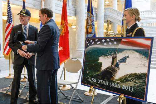 Francisco Kjolseth | The Salt Lake Tribune
Secretary of the Navy Ray Mabus is joined by Utah Governor Gary Herbert following the announcement of the nuclear-powered submarine USS Utah (SSN 801) at the Utah Capitol on Tuesday.  Virginia-class submarines are typically named for states, and the Navy had been waiting to name the submarine-- whose registry number is to be 801, the telephone code for Salt Lake City and most of the Wasatch Front. The USS Utah still needs to be constructed and is expected to be delivered to the Navy in 2022.