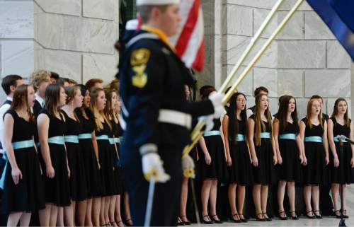 Francisco Kjolseth | The Salt Lake Tribune
The West Jordan High madrigals join the presentation of the colors during a special ceremony at the Utah Capitol for the announcement of the nuclear-powered submarine USS Utah (SSN 801).  Virginia-class submarines are typically named for states, and the Navy had been waiting to name the submarine-- whose registry number is to be 801, the telephone code for Salt Lake City and most of the Wasatch Front. The USS Utah still needs to be constructed and is expected to be delivered to the Navy in 2022.