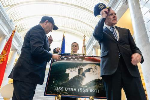 Francisco Kjolseth | The Salt Lake Tribune
Secretary of the Navy Ray Mabus, right, is joined by Utah Gov. Gary Herbert following the announcement of the nuclear-powered submarine USS Utah (SSN 801) at the Utah Capitol on Tuesday. Virginia-class submarines are typically named for states, and the Navy had been waiting to name the submarine ó whose registry number is to be 801, the telephone code for Salt Lake City and most of the Wasatch Front. The USS Utah still needs to be constructed and is expected to be delivered to the Navy in 2022.