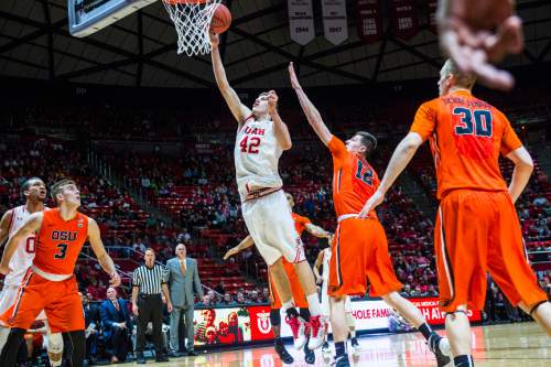 Chris Detrick  |  The Salt Lake Tribune
Utah Utes forward Jakob Poeltl (42) shoots past Oregon State Beavers forward Drew Eubanks (12) during the game at the Huntsman Center Sunday January 17, 2016.