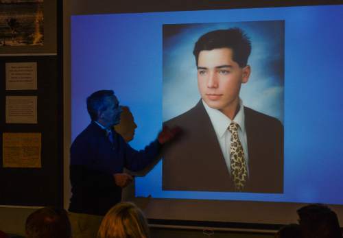 Francisco Kjolseth | The Salt Lake Tribune
Students at Riverton High School get a firsthand lesson in the legislative process as State Representative Dan McCay tries to lighten the mood with a high school picture of himself while teaching Cliff Streiby's U.S. Government class on Jan. 20. McCay figured students could benefit from his experience and learn about the upcoming legislative session, which begins on Monday.