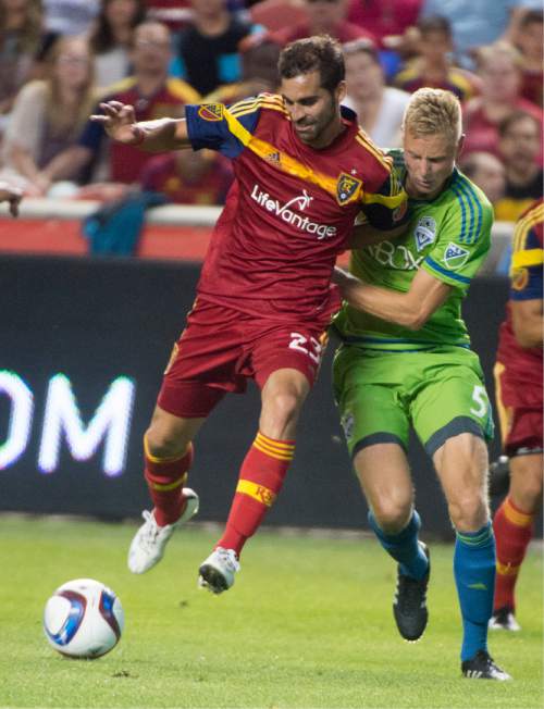 Rick Egan  |  The Salt Lake Tribune

Real Salt Lake forward Sebastian Jaime (23) gets a shove from Seattle Sounders FC midfielder Andy Rose (5), resulting in a yellow card for Rose, in MLS action Real Salt Lake vs. The Seattle Sounders, at Rio Tinto Stadium,  Saturday, August 22, 2015.
