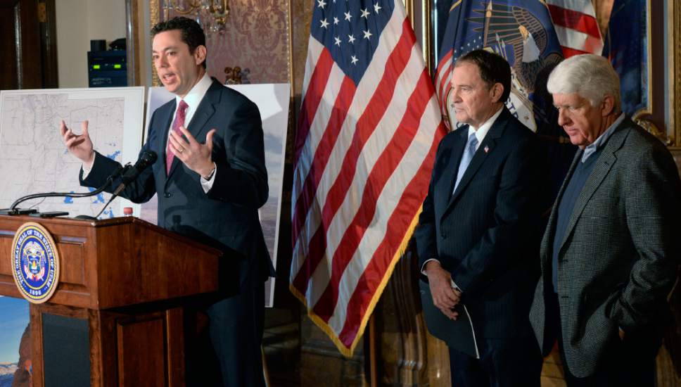 Al Hartmann  |  The Salt Lake Tribune
Utah Congressman Jason Chaffetz, left, speaks in support at unveiling of a "discussion draft" of a Public Lands Initiative bill affecting 18 million acres in seven eastern Utah counties at the Capitol Tuesday Jan. 20.  Governor Gary Herbert and bill sponsor Congressman Rob Bishop, right.  Bishop intends on introducing the bill in congress in the next few weeks.