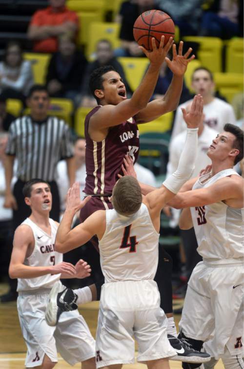 Steve Griffin  |  The Salt Lake Tribune


Lone Peak's Frank Jackson rises up as he shoots over the American Fork defense during boy's basketball game at Utah Valley University in Provo, Wednesday, January 20, 2016.