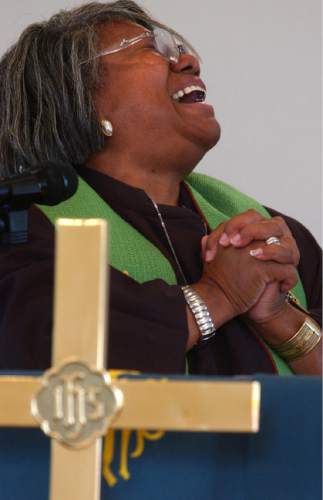 Leah Hogsten  |  The Salt Lake Tribune

Rev. Nurjhan Govan is the new pastor at Trinity African Methodist Episcopal Church, a small mostly black church in downtown SLC. September 25, 2005.