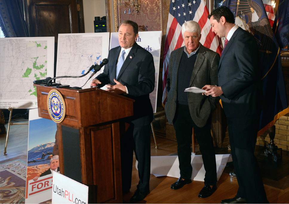 Al Hartmann  |  The Salt Lake Tribune
Utah Governor Gary Herbert, left, speaks in support at unveiling of a "discussion draft" of a Public Lands Initiative bill affecting 18 million acres in seven eastern Utah counties at the  Capitol Tuesday Jan. 20. Congressman Jason Chaffetz and bill sponsor Congressman Rob Bishop, right.  Bishop intends on introducing the bill in congress in the next few weeks.