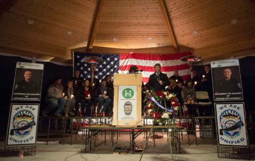 Rick Egan  |  The Salt Lake Tribune

Unified police officer Jon Richey speaks at a vigil for Doug Barney, hosted by Holladay City and the Unified Police Department officers of the Holladay Precinct and sponsored by the Salt Lake Valley Law Enforcement Association, at the  Holladay City Hall, Wednesday, January 20, 2016.