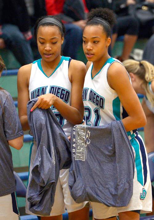 Leah Hogsten  |  The Salt Lake Tribune
Twins Dominque and Monique Mills are a driving force for Juan Diego High School's basketball team. Juan Diego High School girls basketball team defeated Morgan High School 75-55, Friday, January 16, 2015.