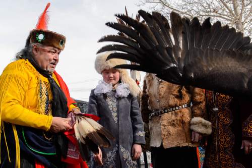 Trent Nelson  |  The Salt Lake Tribune
Aisholpan Nurgaiv, a 15-year-old Mongolian girl who is the first female in 2,000 years to learn to be a eagle hunter, was given a Comanche blessing by Waha Thuweeka, at the Kimball Art Center in Park City, on Friday, Jan. 22, 2016. Nurgaiv is the subject of the Sundance documentary "The Eagle Huntress."