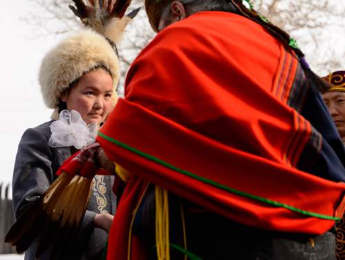 Trent Nelson  |  The Salt Lake Tribune
Aisholpan Nurgaiv, a 15-year-old Mongolian girl who is the first female in 2,000 years to learn to be a eagle hunter, was given a Comanche blessing by Waha Thuweeka, at the Kimball Art Center in Park City, on Friday, Jan. 22, 2016. Nurgaiv is the subject of the Sundance documentary "The Eagle Huntress."