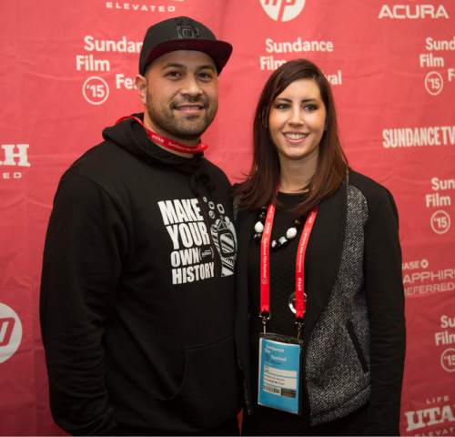 Steve Griffin  |  The Salt Lake Tribune

Tony Vainuku and Erika Cohn co-directors  of "In Football We Trust" are photographed on the Red Carpet as they attend the Sundance premiere of their documentary at the Salt Lake Community College's The Grand Theatre , in Salt Lake City, Friday, January 23, 2015. The documentary follows four teen boys, Harvey Langi, Leva Bloomfield, Vita Bloomfield and Fihi Kaufusi, from Utah's Pacific Islander community as they navigate the world of high-school football. The boys deal with such issues as extreme poverty, gang influence and family pressures to succeed on the field.