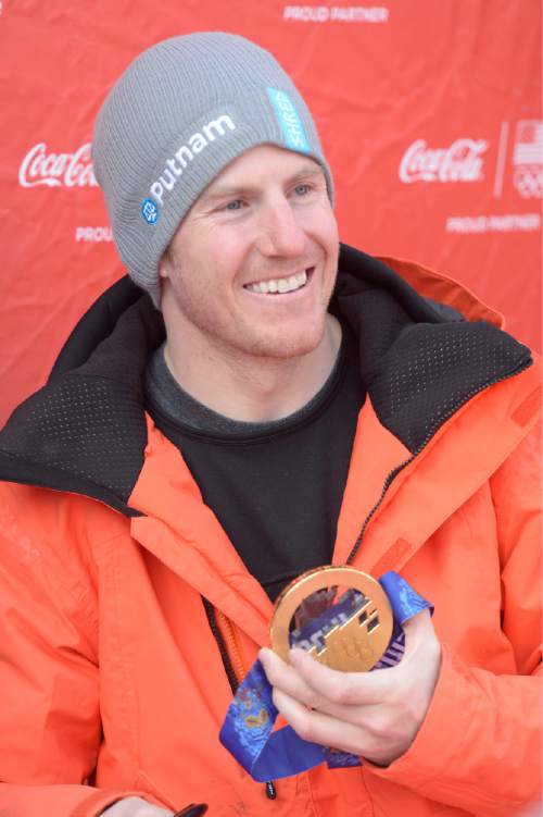 Rick Egan  |  The Salt Lake Tribune

Olympic Gold Medalist Ted Ligety  holds his gold medal as he poses for a photograph at Park City Mountain Resort, Saturday, March 29, 2014.