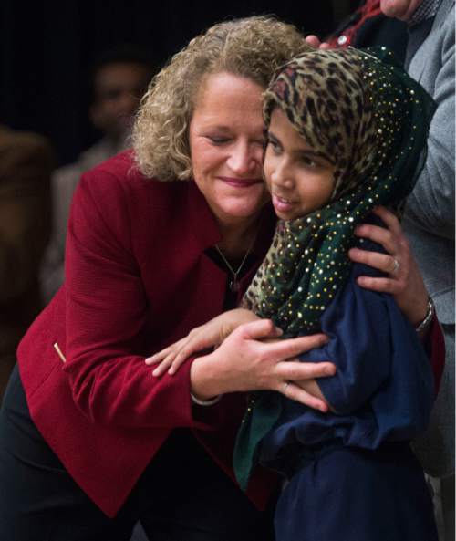 Steve Griffin  |  The Salt Lake Tribune


Salt Lake City Jackie Biskupski hugs Mountain View Elementary school third-grader  Amina Shelali following her State of the City address at Mountain View Elementary School in Salt Lake City, Tuesday, January 26, 2016. Shelali sat on the stage with other Salt Lake City citizens during the mayor's speech.