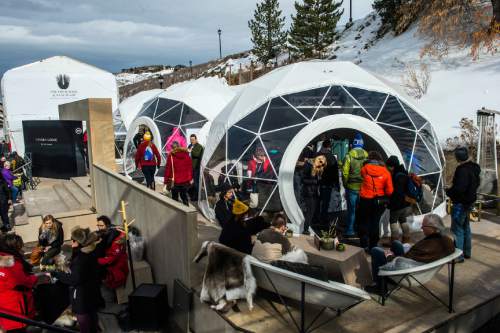 Chris Detrick  |  The Salt Lake Tribune
Festivalgoers stop at the Festival Base Camp during the Sundance Film Festival in Park City on Saturday.